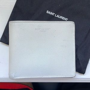 Pre-owned leather bifold wallet.